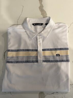 Travis Mathew White Polo with Navy and Yellow Stripes
